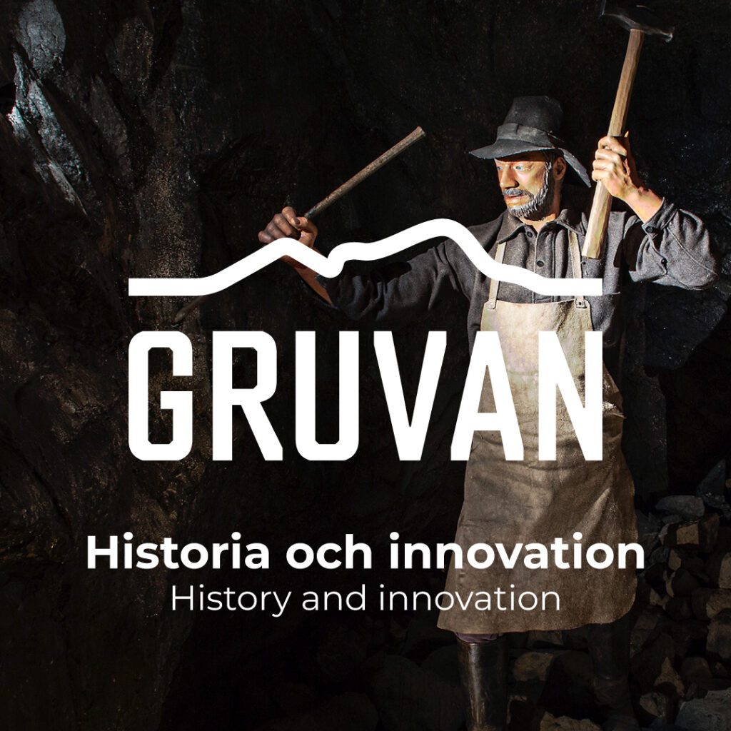 Trädocka som illustrera en manlig gruvarbetare från förr. I bilden visas utställningens Gruvans logga.